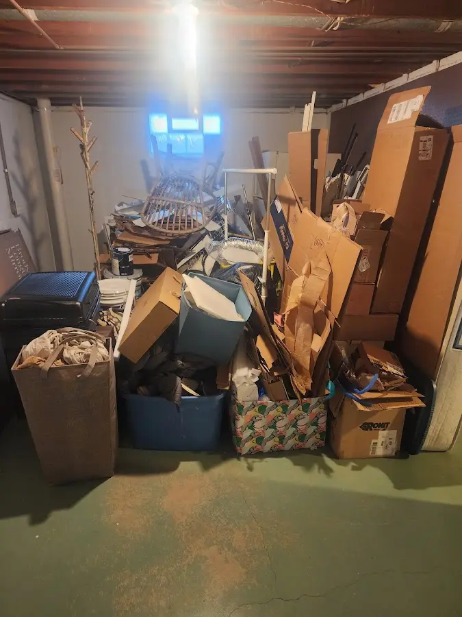 Roll-off dumpster container at job site for 2 Yard Dumpster Rental in Moosic